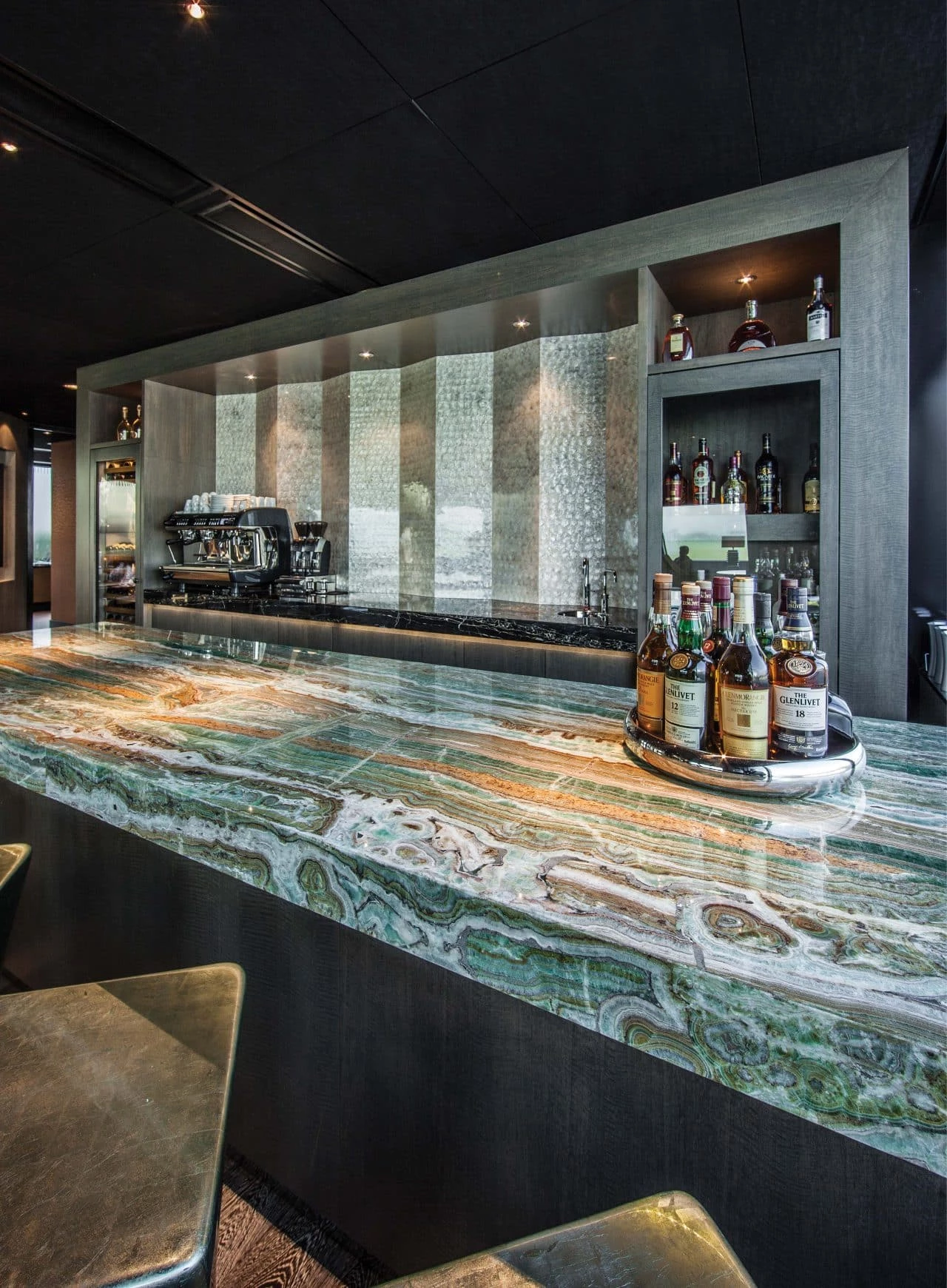 Premium natural marble and granite stone slabs for commercial real estate flooring.