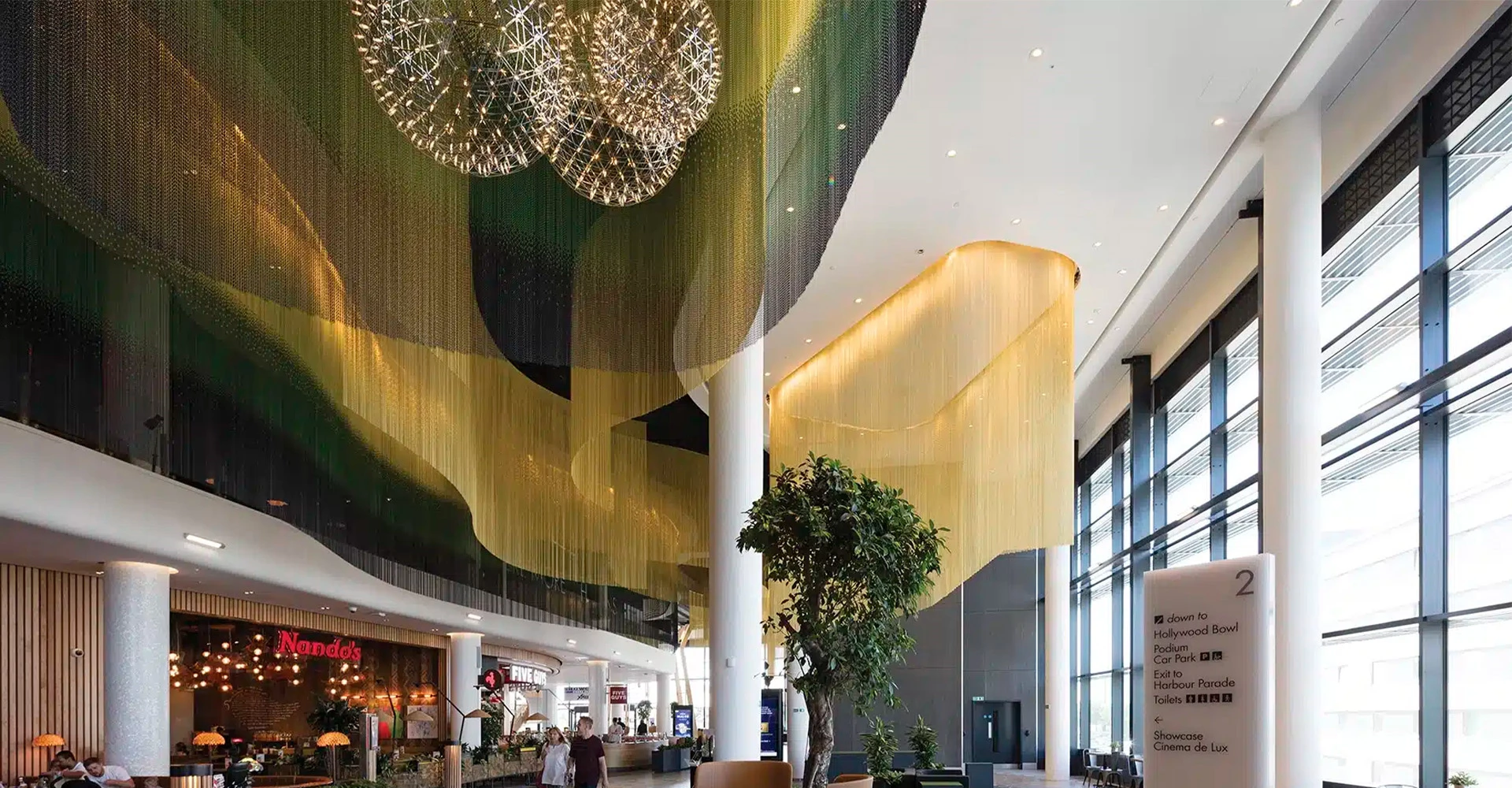 Architectural metal frames and glass partitions for commercial office spaces.