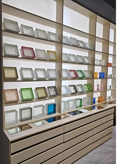 Artistic fluted glass partitions with slim metal frames for office dividers.