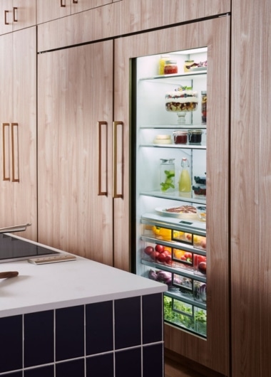 Integrated built-in kitchen appliances, including ovens and dishwashers.