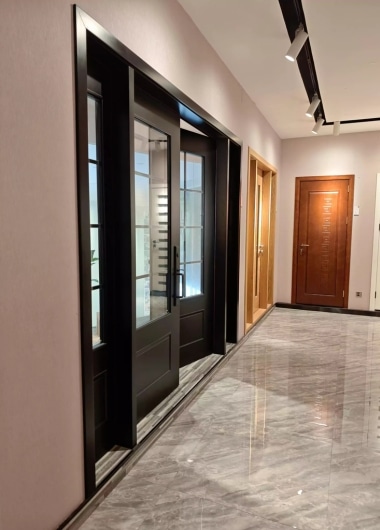 Large-scale luxury sliding glass doors for balcony and terrace applications.