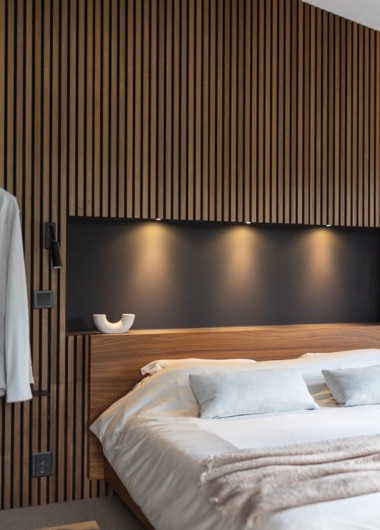 High-end wooden wall cladding and veneer panels for luxury villa design.