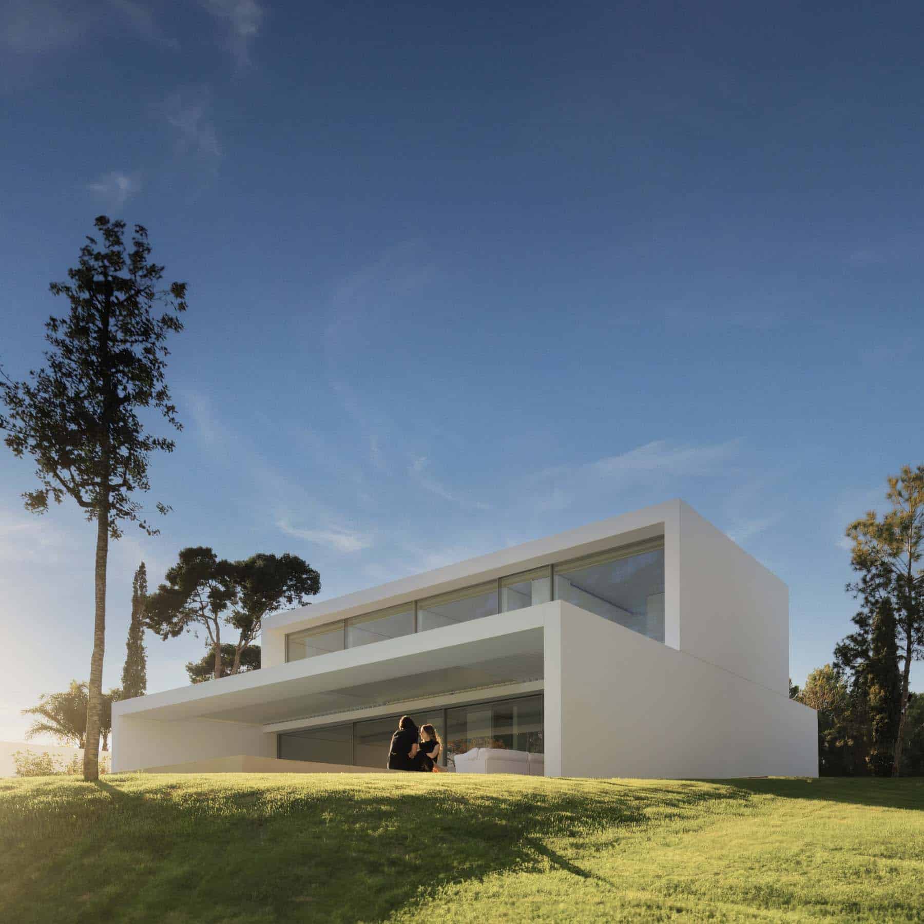 Exterior view of the minimalist NIU HOUSES project in Valencia, showcasing George Group's premium thermal break aluminum windows and facade solutions.