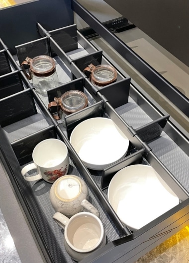 Premium soft-close cabinet hinges and drawer slides for kitchen joinery.